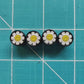 Daisy Flower Happy Face Tire Valve Caps - Black Aluminum - Set of Four