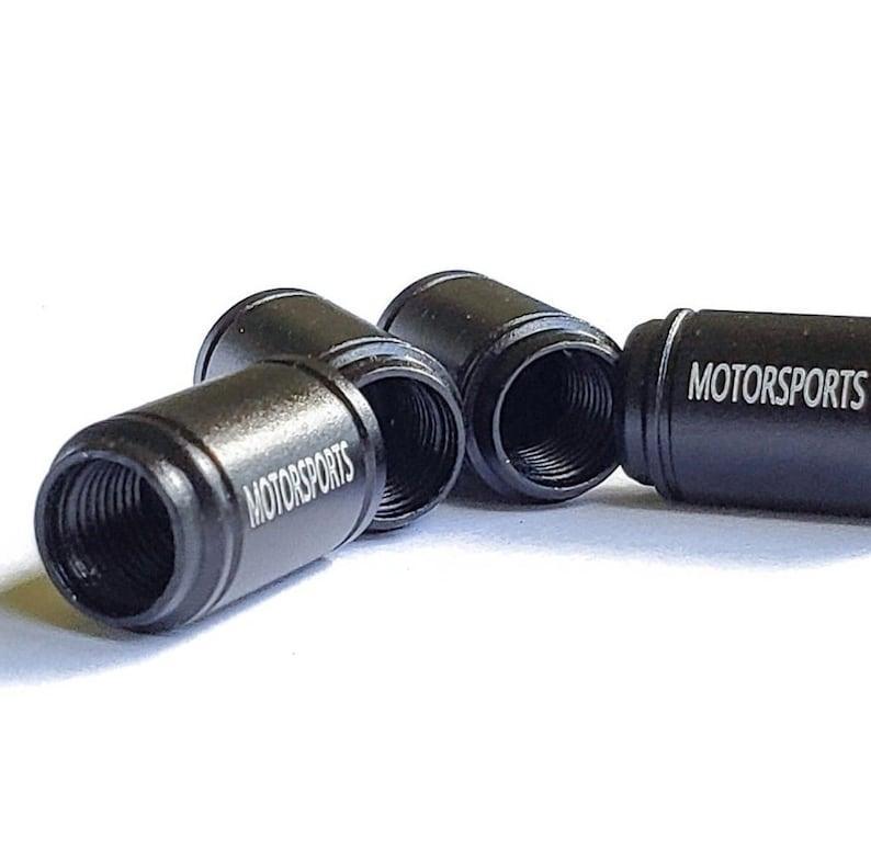 Atomic Symbol Tire Valve Stem Caps - Black Aluminum - Set of Four