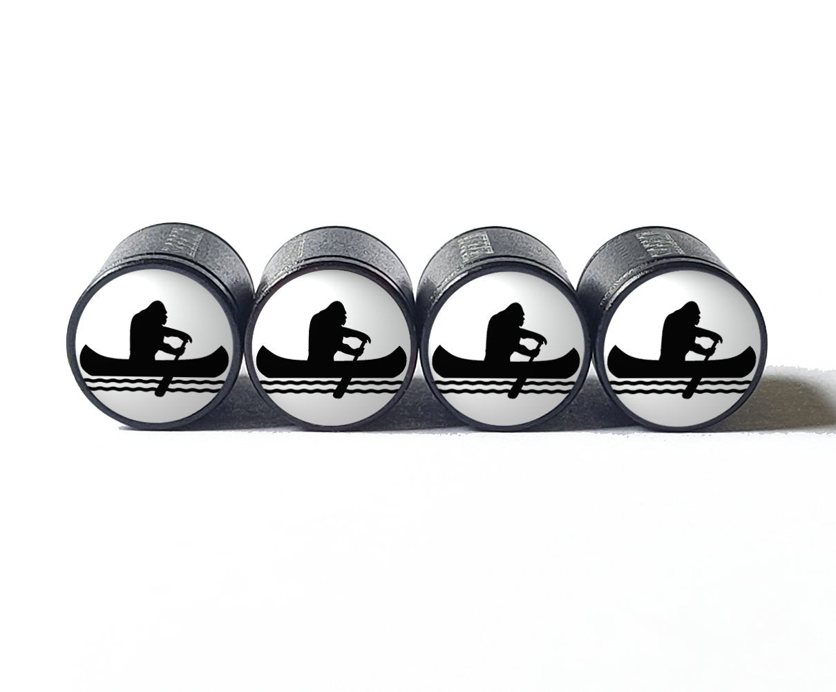 Bigfoot Sasquatch in a Canoe Tire Valve Caps - Black Aluminum - Set of Four