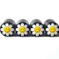 Happy Flower Face Tire Valve Caps - Black Aluminum - Set of Four