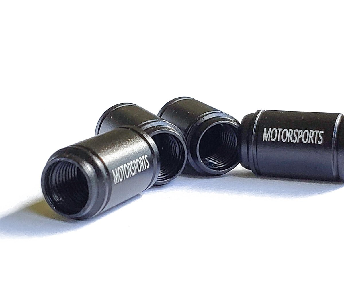 Mountain Bike Rider Tire Valve Caps - Black Aluminum - Set of Four